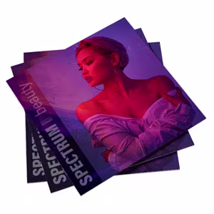 What is the safety needed for a spiral bound booklet to keep design elements from being punched by the coil.
